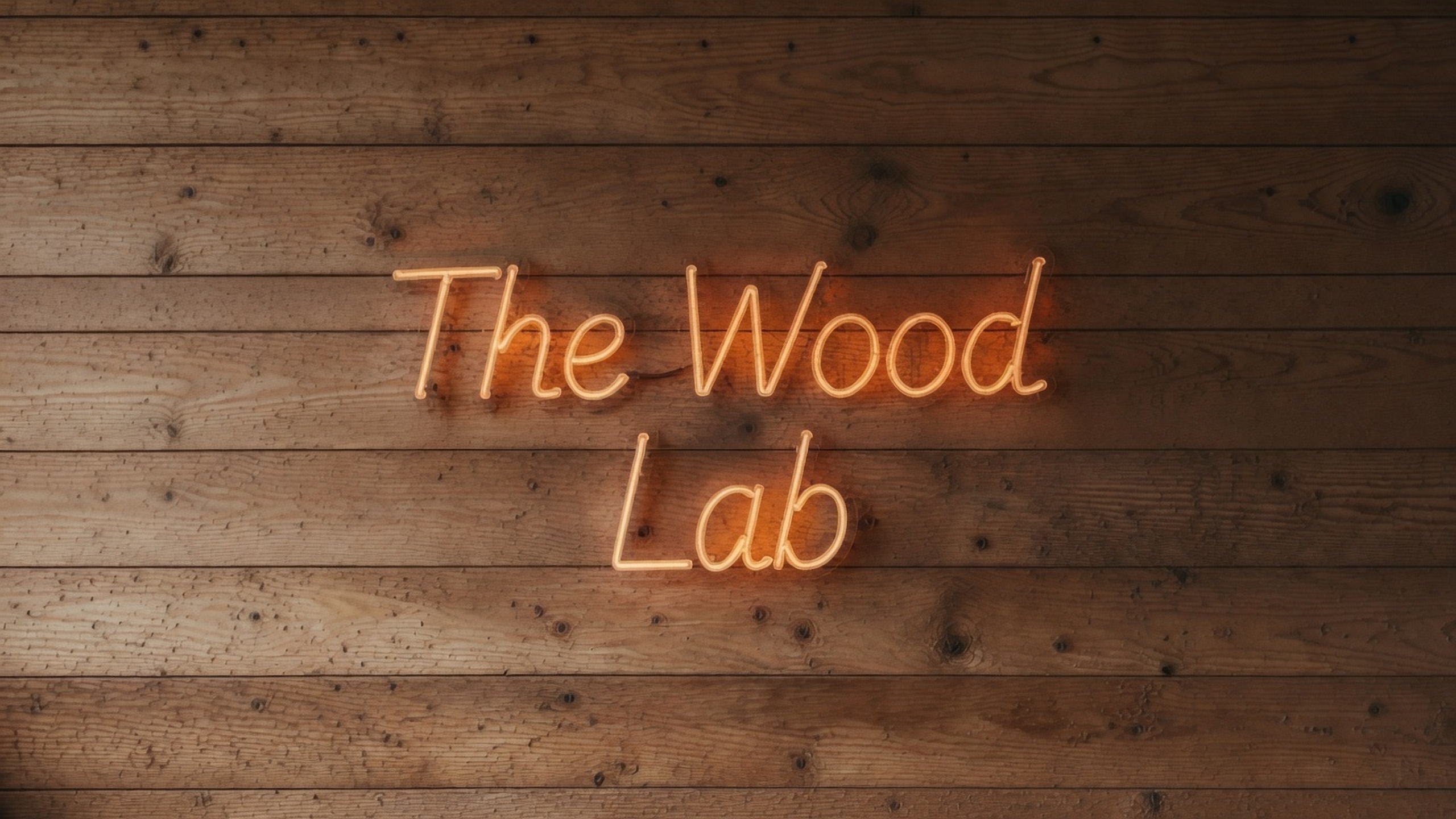 The Wood Lab neon sign on wood